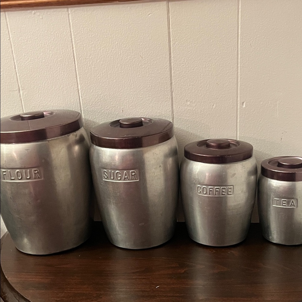 Vintage Kromex spun aluminum 4 piece Canister Set with Dark Brown Lids